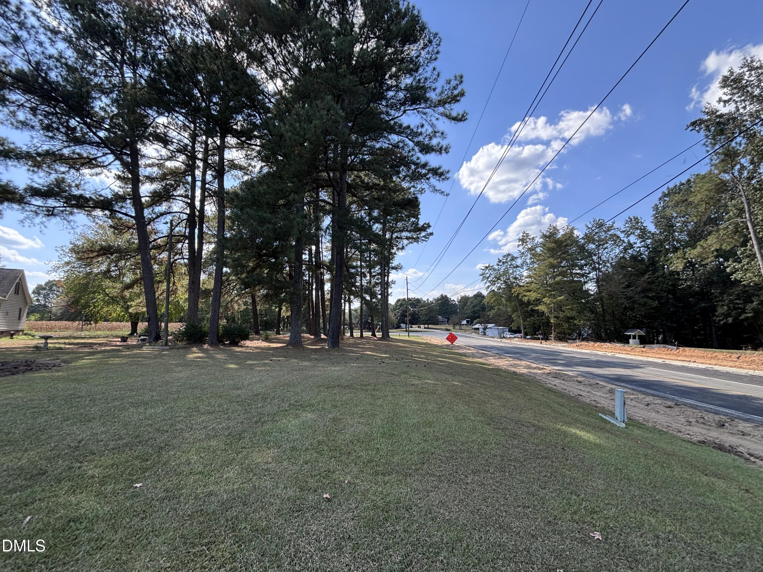 3007 South Smithfield Road Knightdale, NC 27545 - Photo 63 of 68 a view of a house with a yard