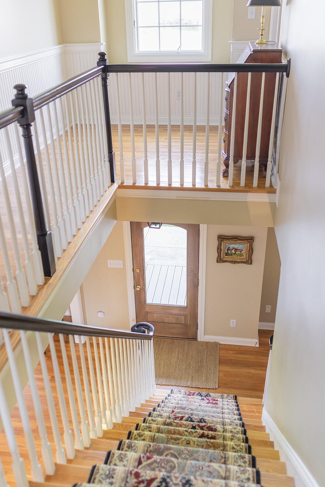 6395 Delaney Ferry Road Versailles, KY 40383 - Photo 6 of 52 Charming second-story landing featuring beadboard detail, adding character and a warm, inviting touch to the upper level.