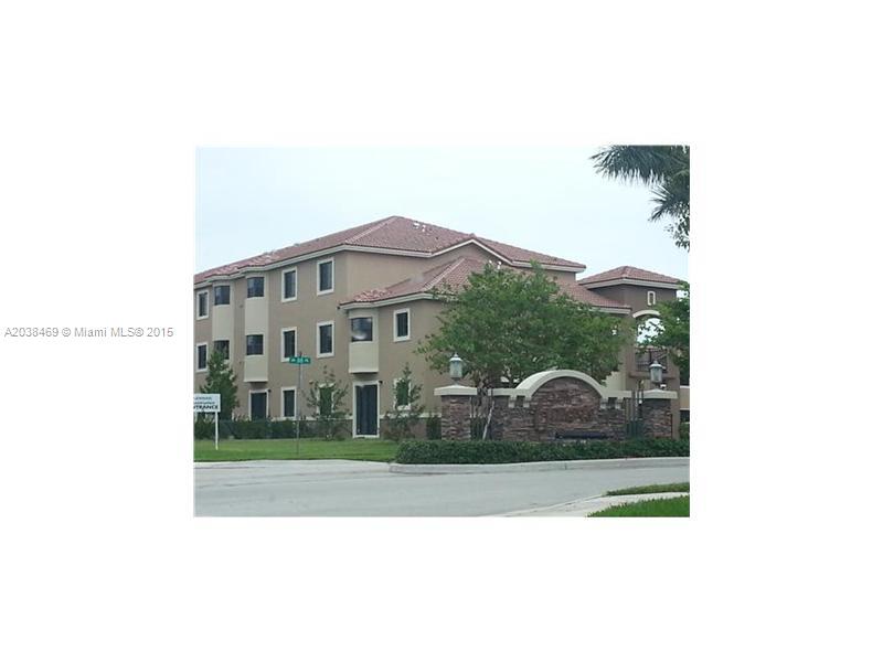 22501 Southwest 88th Place, Unit 1525 Cutler Bay, FL 33190 - Photo 2 of 8 a picture of a person on a street