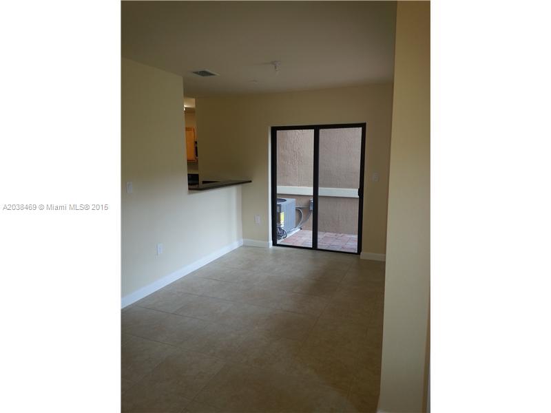 22501 Southwest 88th Place, Unit 1525 Cutler Bay, FL 33190 - Photo 5 of 8 a view of an empty room