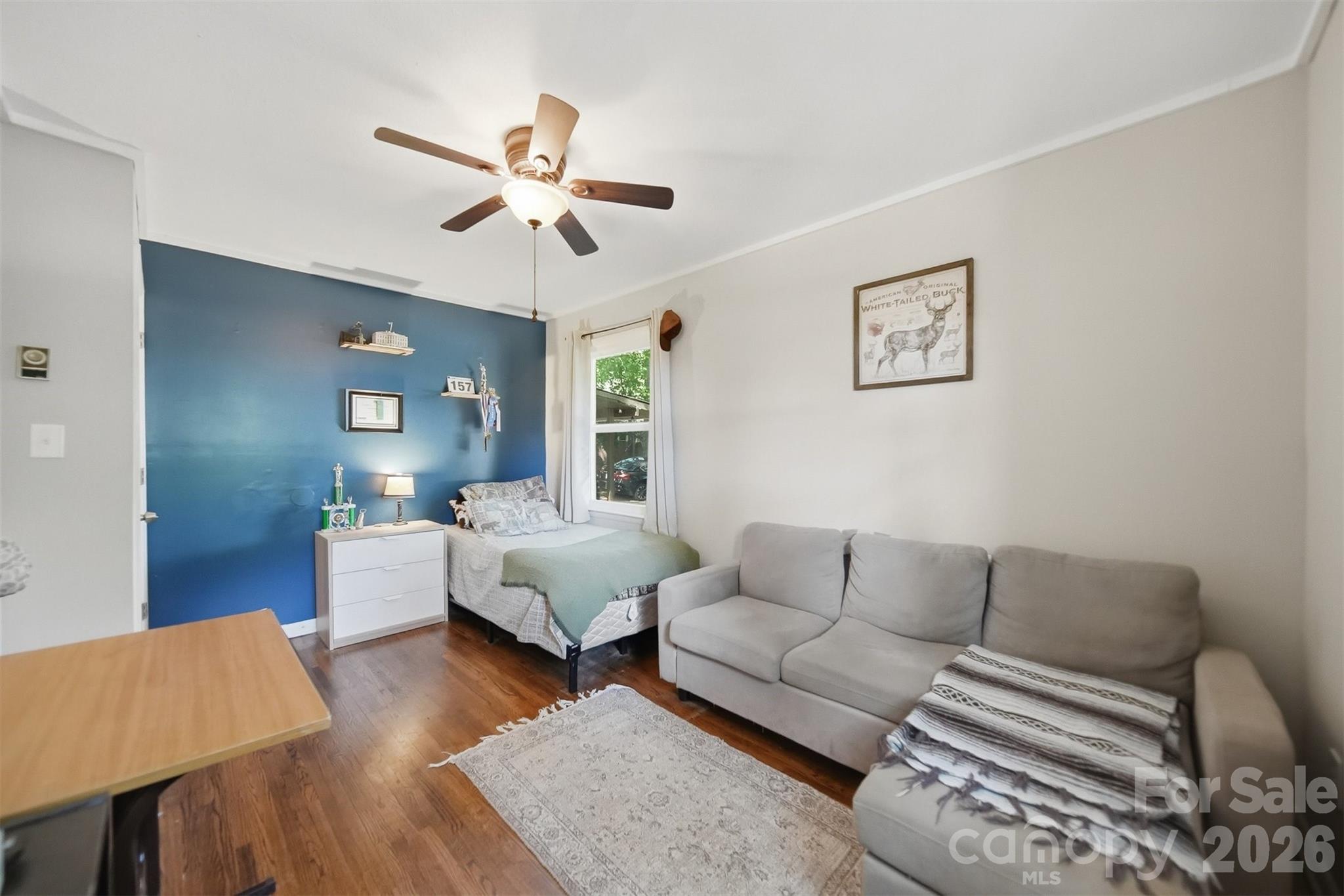 1312 County Home Road Conover, NC 28613 - Photo 15 of 25 a living room with furniture and wooden floor