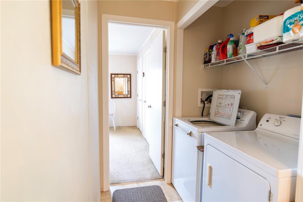 3 Edam Street Punta Gorda, FL 33950 - Photo 12 of 22 a utility room with dryer and washer