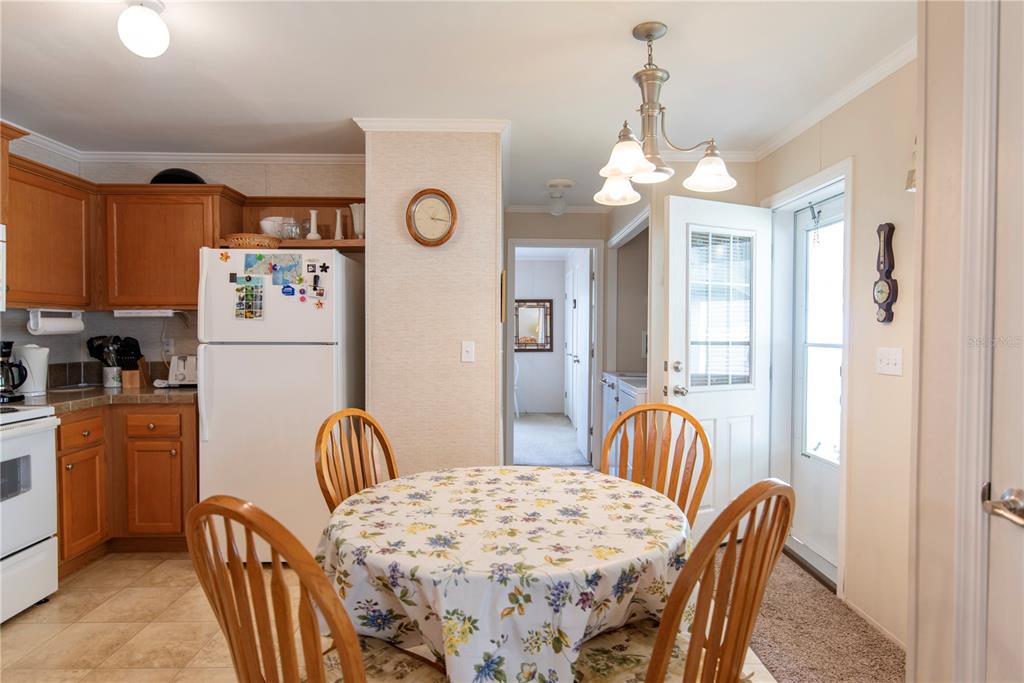 3 Edam Street Punta Gorda, FL 33950 - Photo 4 of 22 a dining room with furniture and window