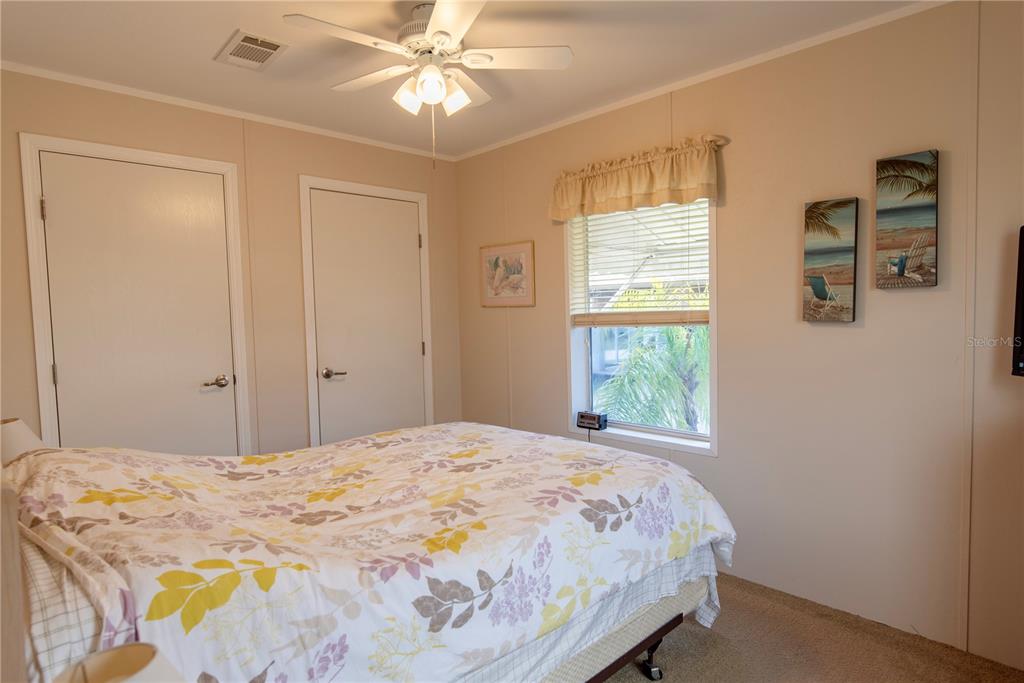 3 Edam Street Punta Gorda, FL 33950 - Photo 10 of 22 a bedroom with a bed and a window