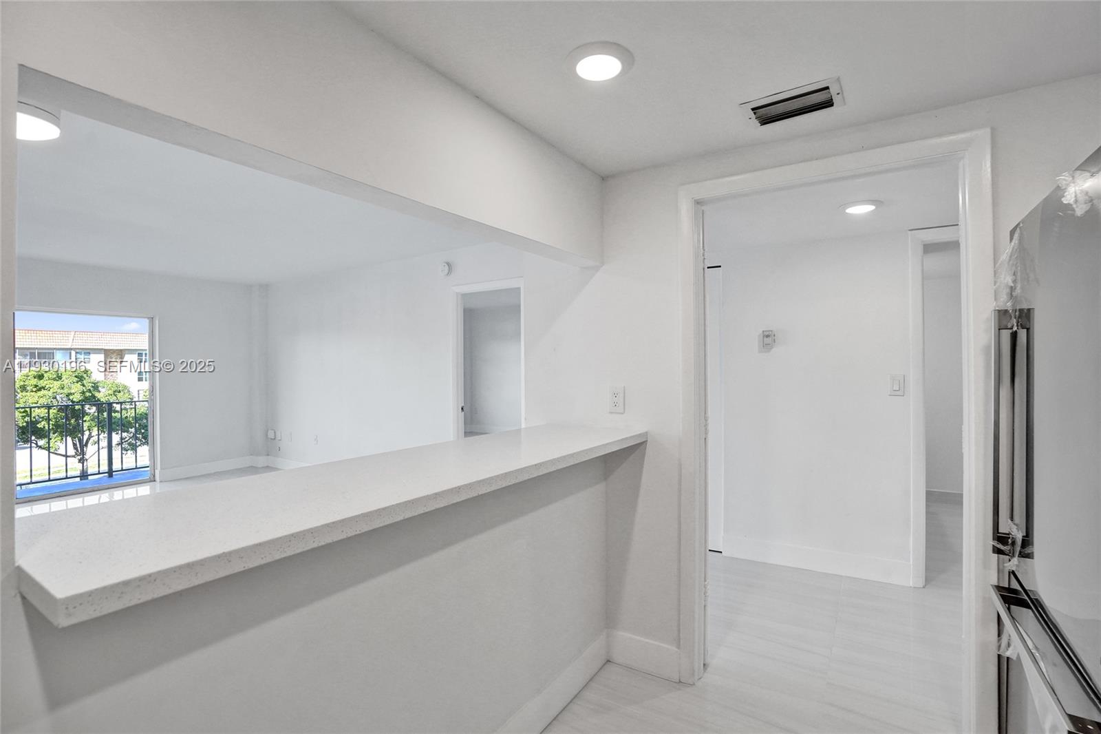 4164 Inverrary Drive, Unit 305 Lauderhill, FL 33319 - Photo 11 of 32 a view of an empty room with a window