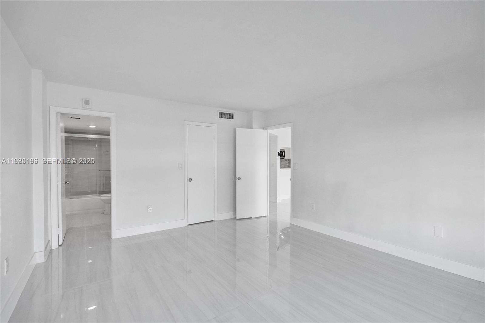 4164 Inverrary Drive, Unit 305 Lauderhill, FL 33319 - Photo 18 of 32 wooden floor in an empty room