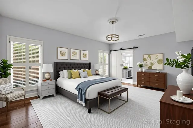 a view of a patio with couple of chairs and a couch