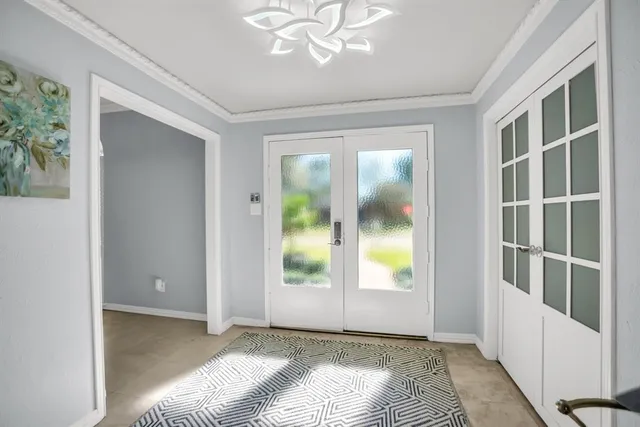 a view of livingroom with furniture and windows