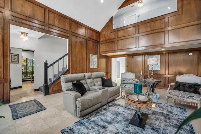 a kitchen with stainless steel appliances granite countertop a refrigerator sink and cabinets