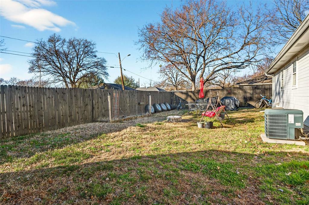 1001 South 4th Street Bonham, TX 75418 - Photo 22 of 27 a view of street with trees