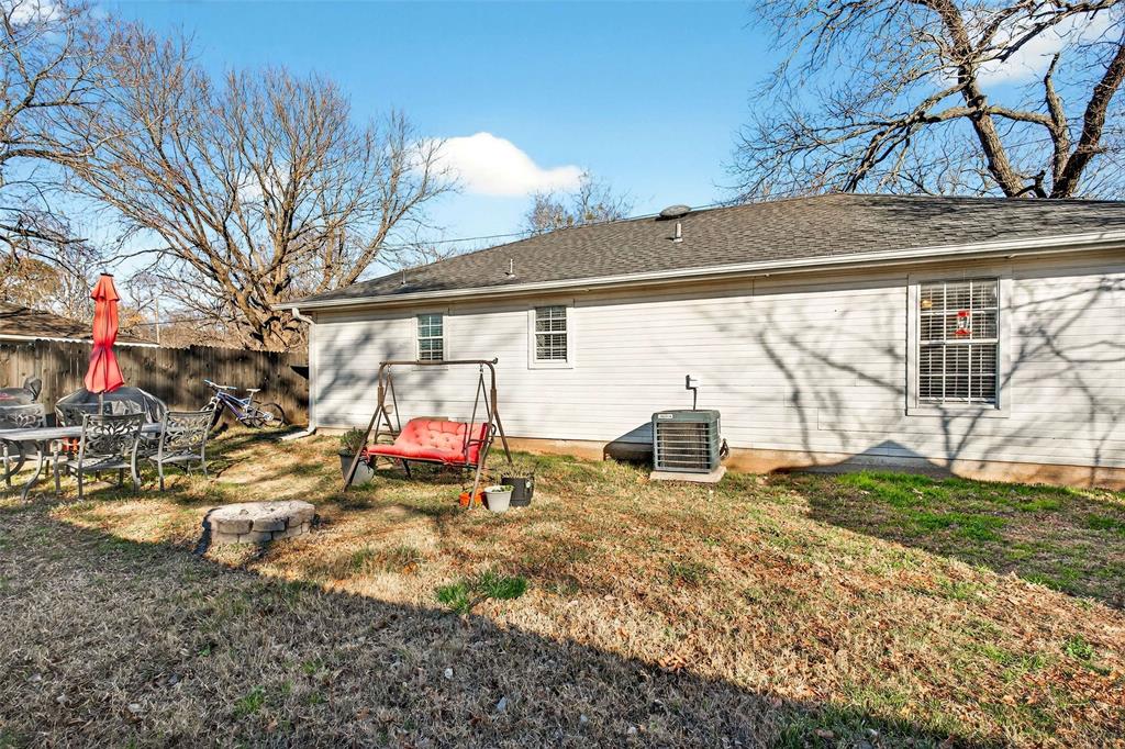1001 South 4th Street Bonham, TX 75418 - Photo 23 of 27 a view of the house with a yard