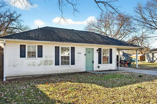 a view of a house with a garden