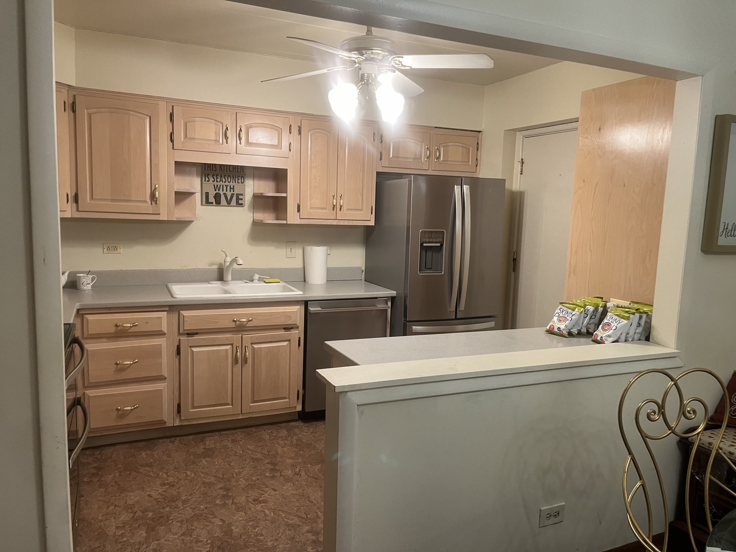 2807 Willow Road, Unit 105 Homewood, IL 60430 - Photo 3 of 8 a kitchen with a refrigerator sink stove and cabinets