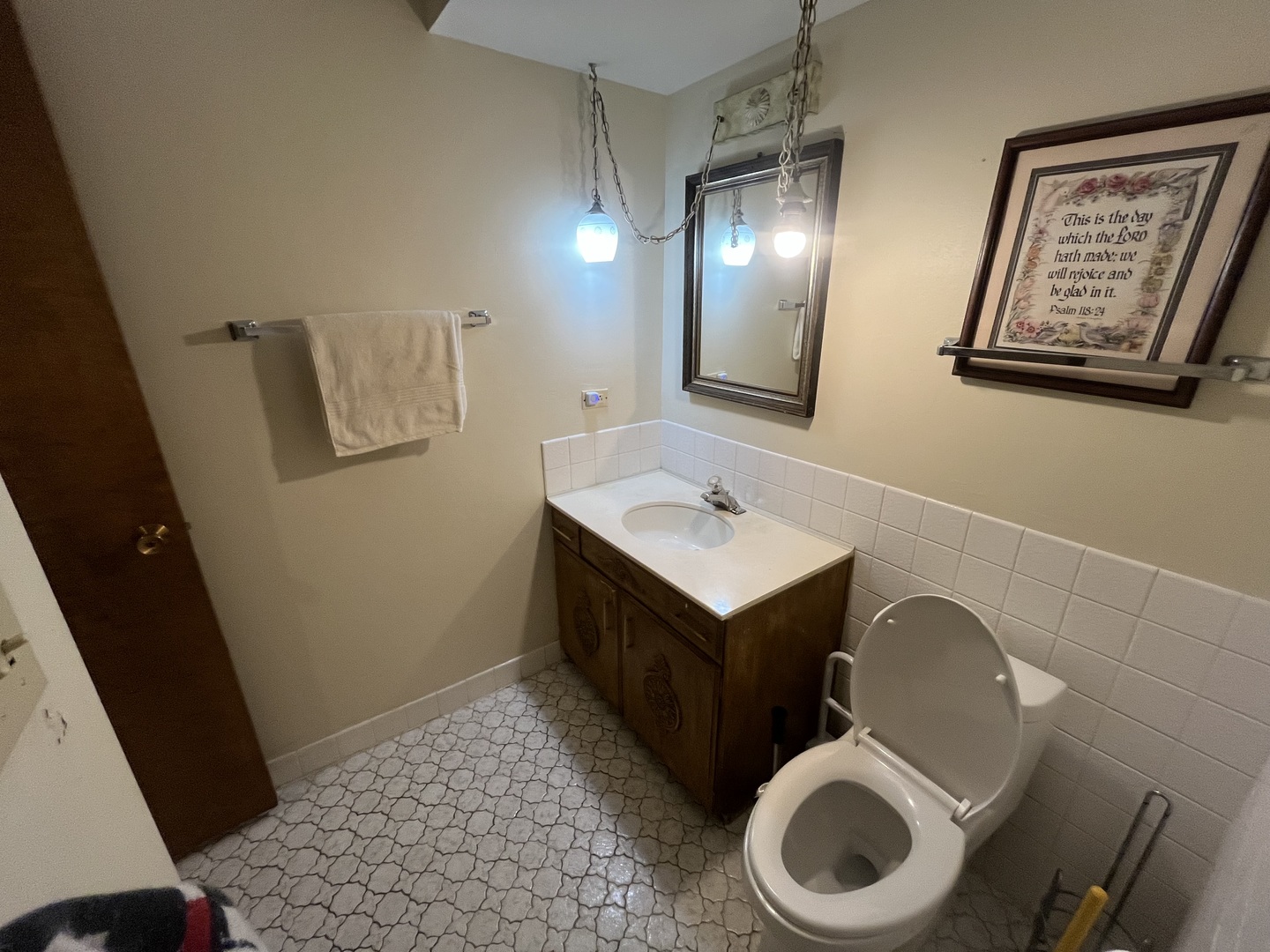 2807 Willow Road, Unit 105 Homewood, IL 60430 - Photo 6 of 8 a bathroom with a toilet sink and mirror