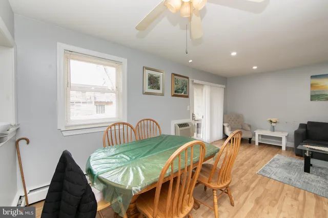 a bedroom with a bed and a chair