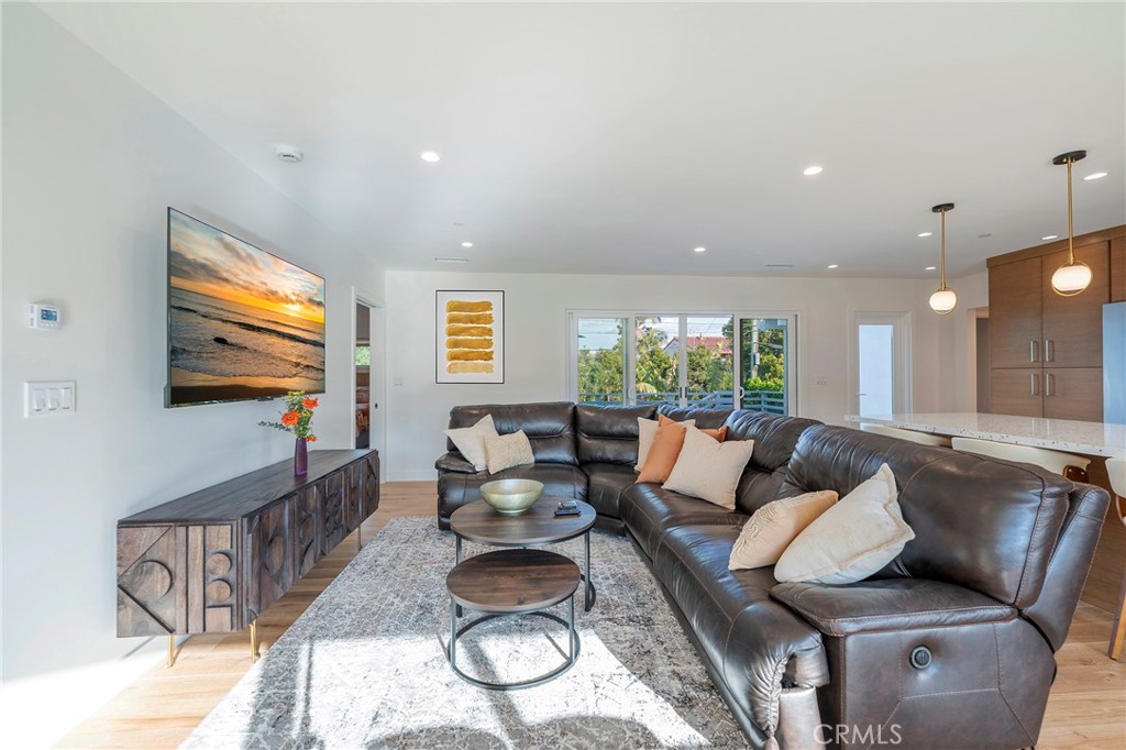 33792 Chula Vista Avenue Dana Point, CA 92629 - Photo 12 of 37 a living room with furniture and a flat screen tv
