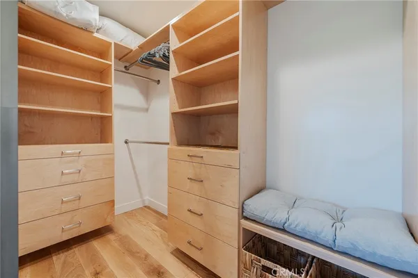 a view of an empty walk in closet
