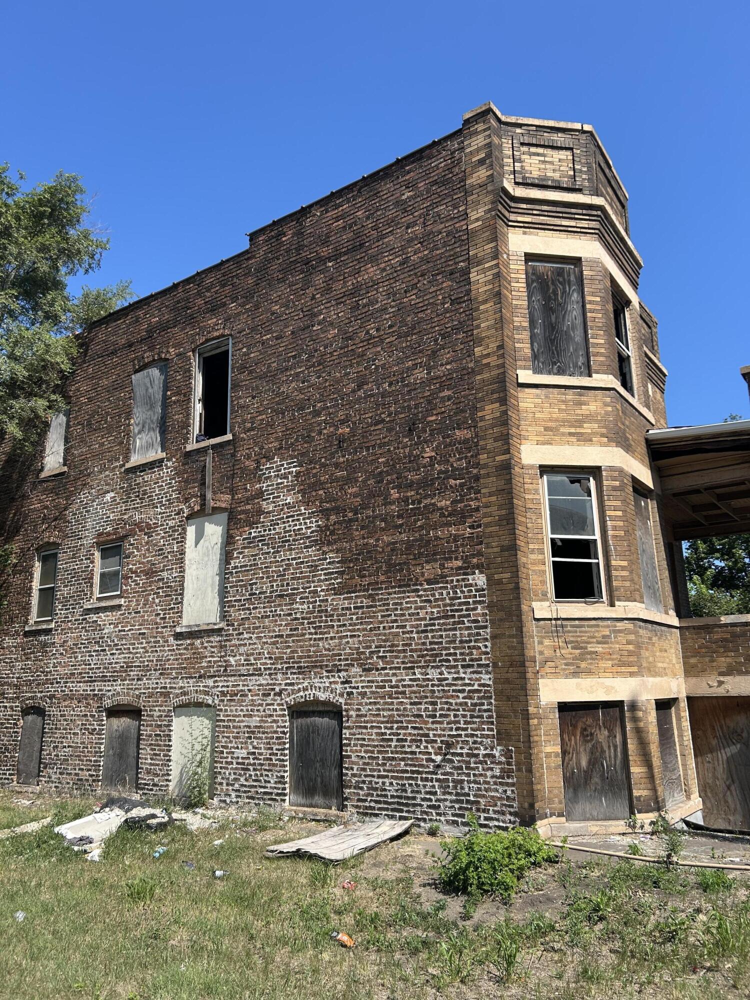420 Adams Street Gary, IN 46402 - Photo 3 of 4 a front view of a house with a yard