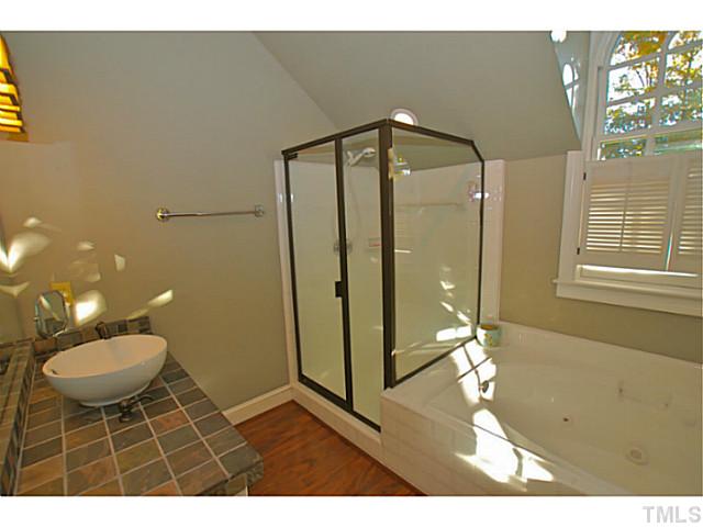 3217 Anderson Drive Raleigh, NC 27609 - Photo 16 of 25 a bathroom with a sink and a mirror