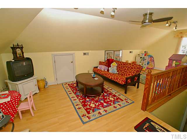 3217 Anderson Drive Raleigh, NC 27609 - Photo 19 of 25 a living room with furniture and a rug