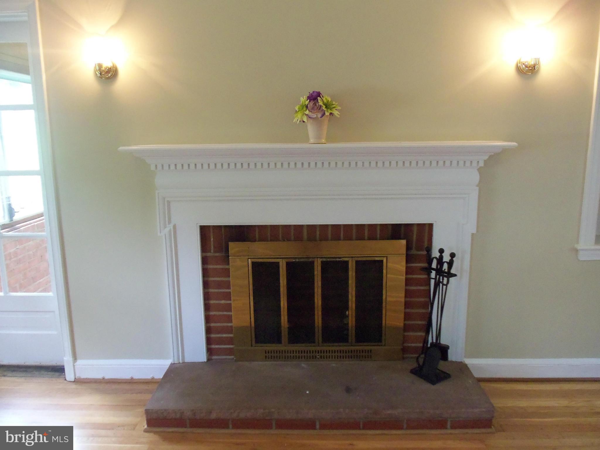 405 Penwood Road Silver Spring, MD 20901 - Photo 9 of 25 a living room with a fireplace
