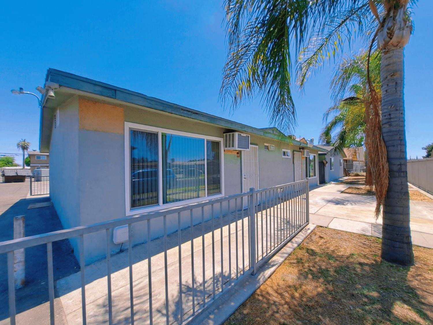 441 South Dearing Avenue Fresno, CA 93702 - Photo 3 of 9 a view of a house with a small yard