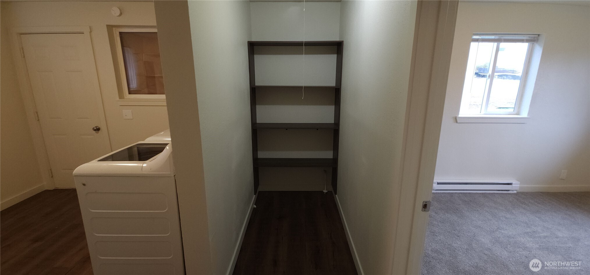 2350 East Pioneer Road Port Angeles, WA 98362 - Photo 21 of 40 a room that has a window in it and a window