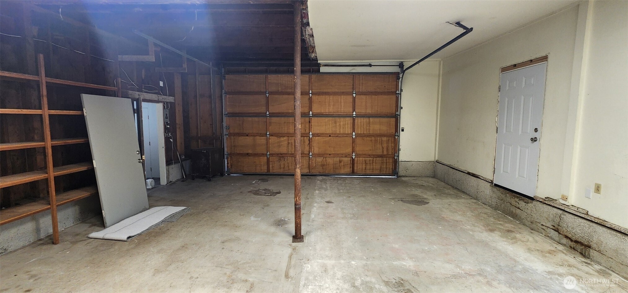 2350 East Pioneer Road Port Angeles, WA 98362 - Photo 28 of 40 a view of an empty room with empty shelves