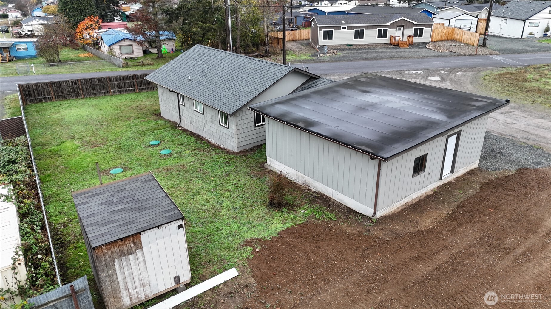 2350 East Pioneer Road Port Angeles, WA 98362 - Photo 9 of 40 a aerial view of a house with a yard and sitting area