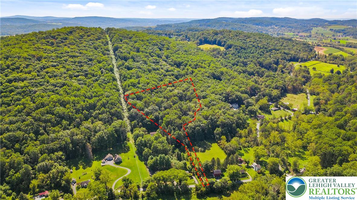 93 Coffeetown Road Easton, PA 18042 - Photo 6 of 11 a view of a lake with a mountain