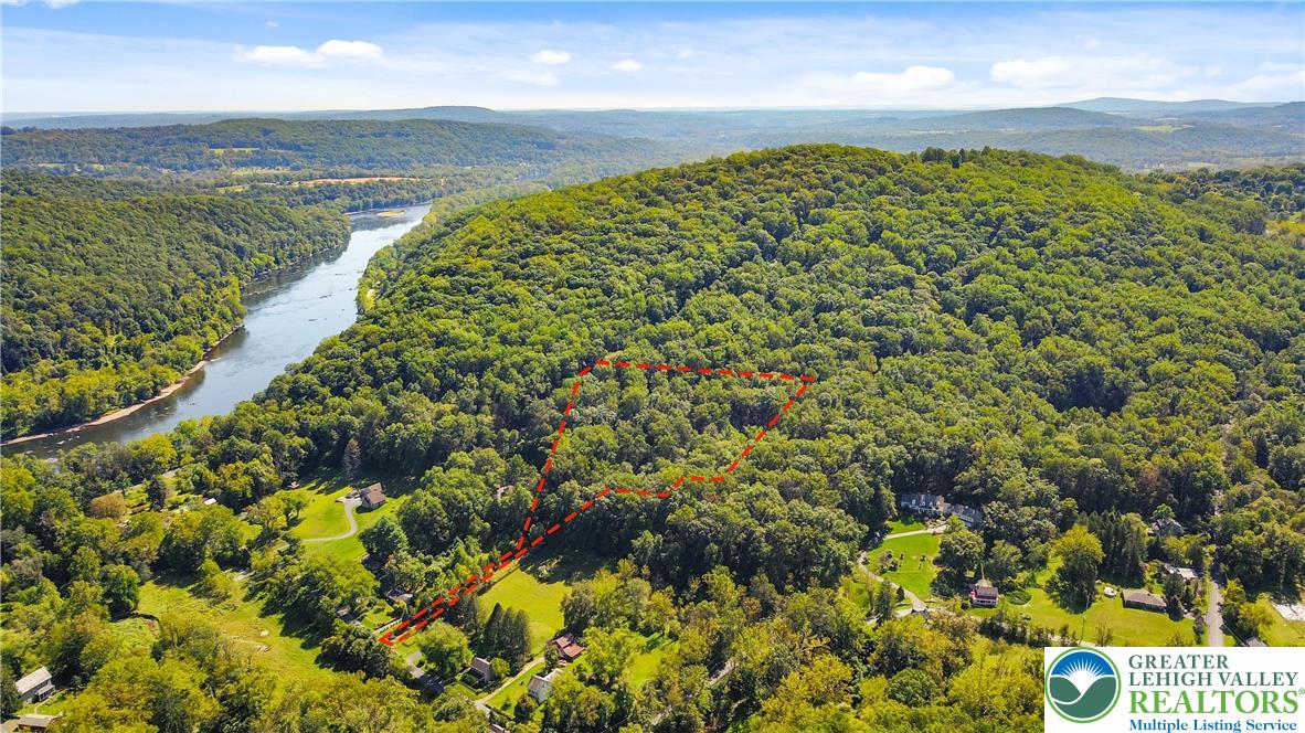 93 Coffeetown Road Easton, PA 18042 - Photo 7 of 11 a view of a yard with an ocean beach