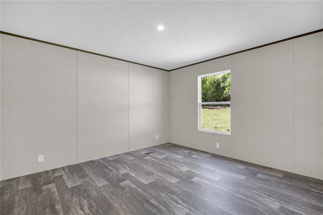 375 Griggs Road Six Mile, SC 29682 - Photo 22 of 36 This versatile room features durable flooring and a bright window overlooking lush greenery.