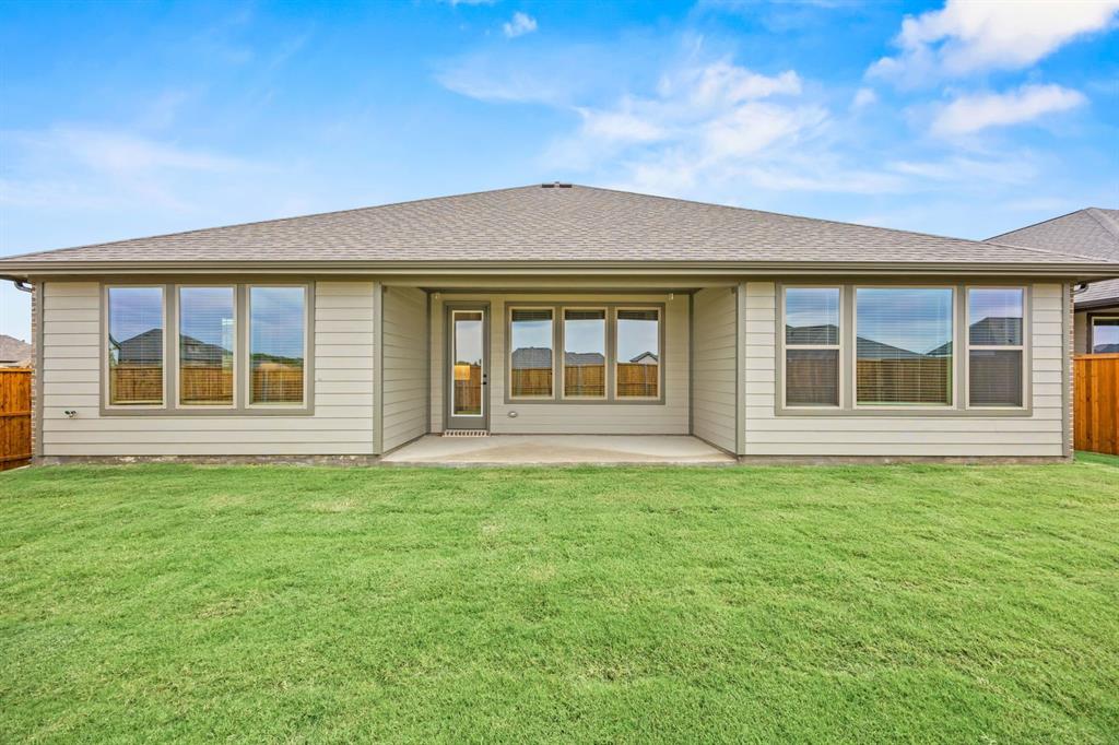 1507 Red Clover Avenue Van Alstyne, TX 75495 - Photo 30 of 30 front view of a house with a yard