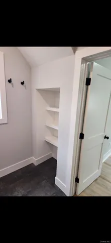 a view of entryway with wooden floor