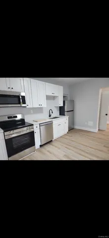 a view of kitchen with stainless steel appliances