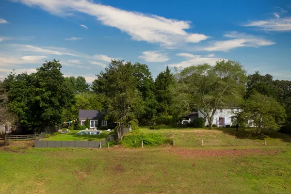 a view of a house with a big yard