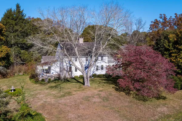 a backyard of a house with lots of green space