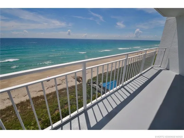 a view of balcony with ocean