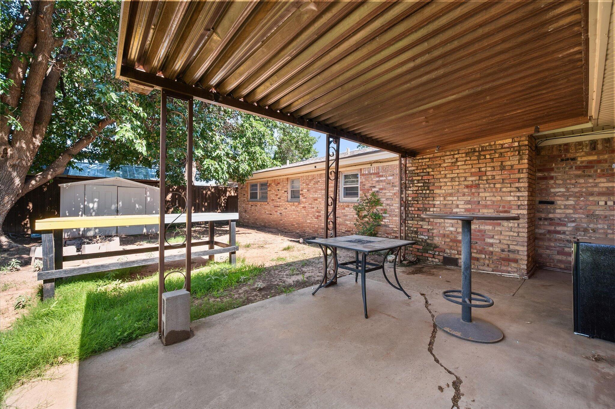 4604 27th Street Lubbock, TX 79410 - Photo 33 of 36 a view of yard with patio
