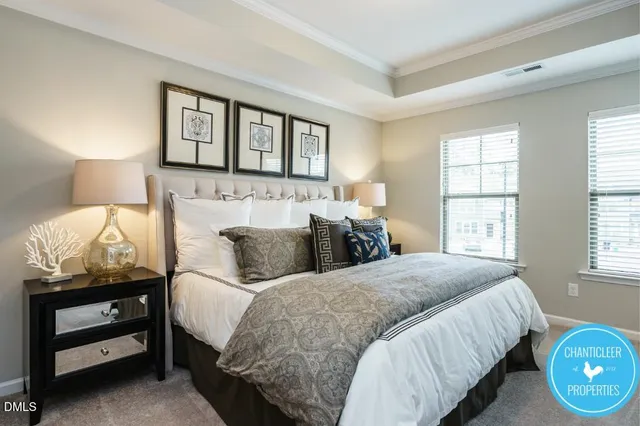 a bed room with a bed and a window