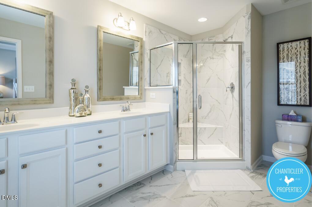 1119 Midtowne Way Durham, NC 27713 - Photo 17 of 26 a bathroom with a granite countertop sink mirror and double