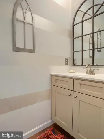 a view of entryway with stairs and wooden floor