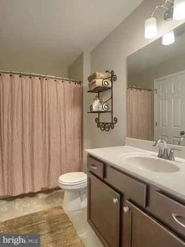 a front view of a house with a big yard