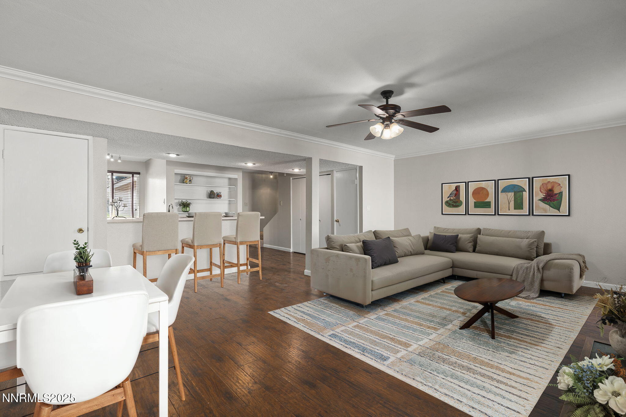1056 Bradley Square Sparks, NV 89434 - Photo 5 of 15 a living room with furniture a table and wooden floor