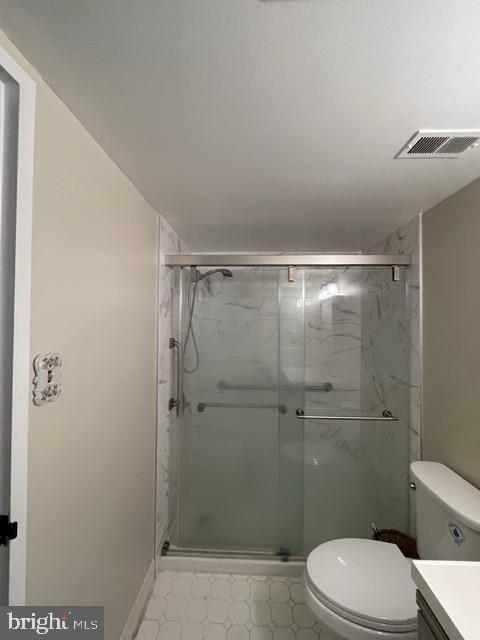 7600 Roosevelt Boulevard, Unit 904 Philadelphia, PA 19152 - Photo 14 of 23 a bathroom with a toilet and a shower