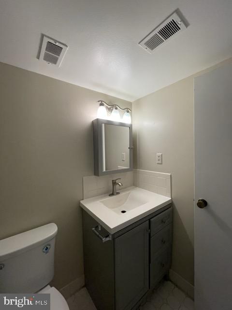 7600 Roosevelt Boulevard, Unit 904 Philadelphia, PA 19152 - Photo 16 of 23 a bathroom with a sink toilet and mirror