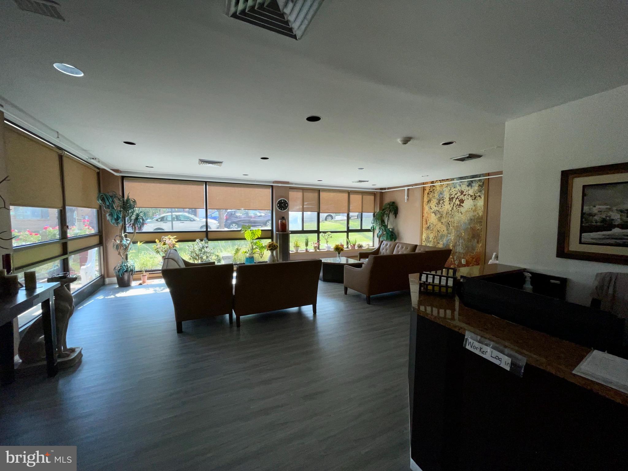 7600 Roosevelt Boulevard, Unit 904 Philadelphia, PA 19152 - Photo 21 of 23 a living room with furniture window and wooden floor