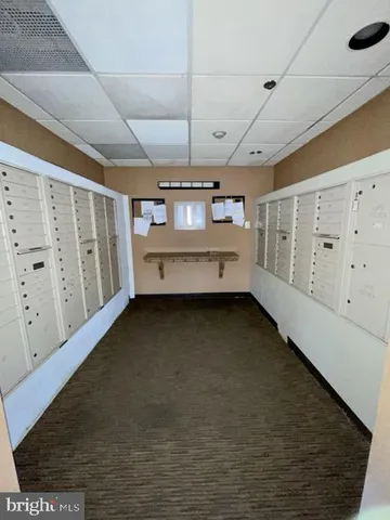 a bed room with furniture and a window