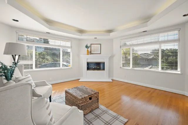 an aerial view of a house with a yard and garden