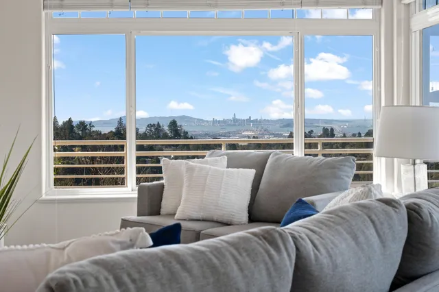 a bedroom with a bed and a lamp